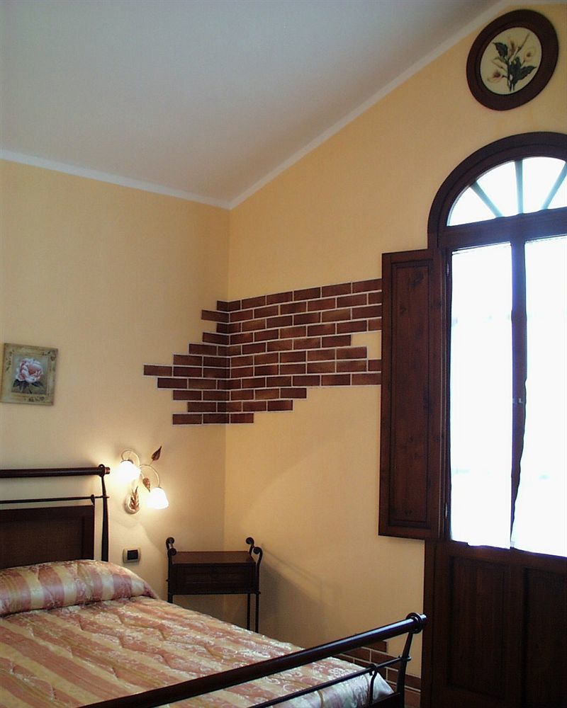 Hotel La Corte Rosada Villasimius Bagian luar foto